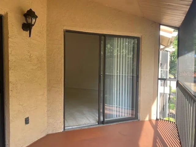 a kitchen with stainless steel appliances a refrigerator and a counter top