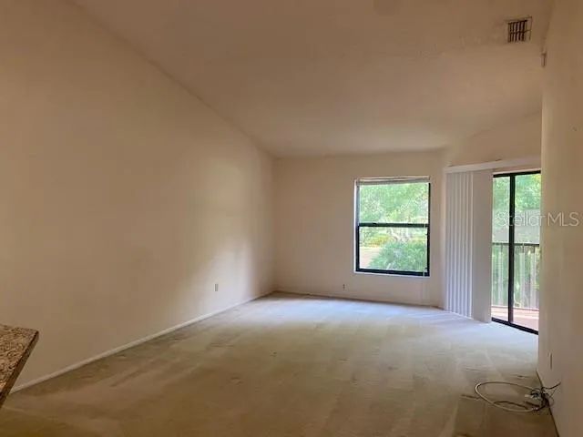 an empty room with windows