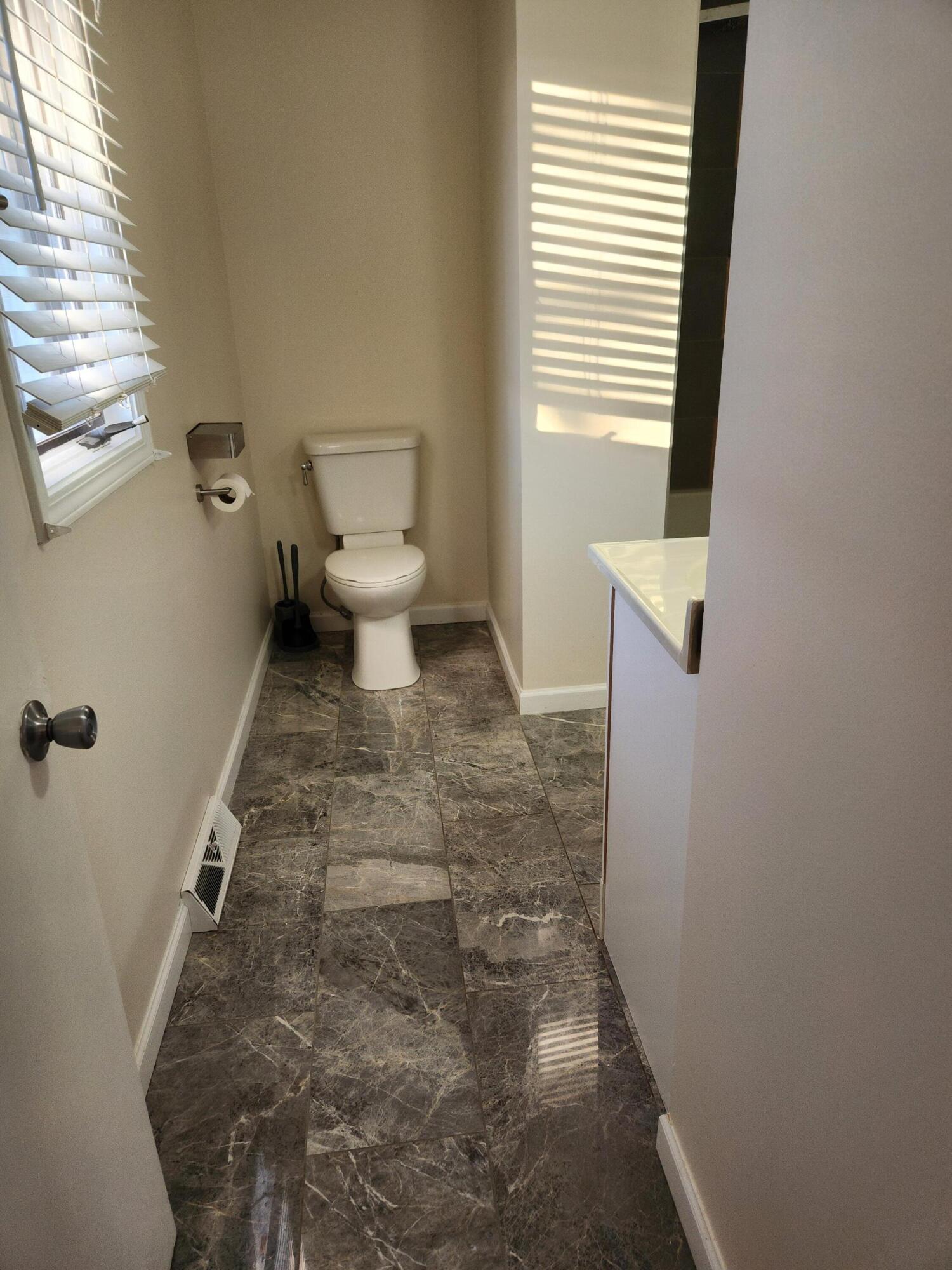2308 Flint Court Dyer, IN 46311 - Photo 15 of 37 a bathroom with a toilet and a shower