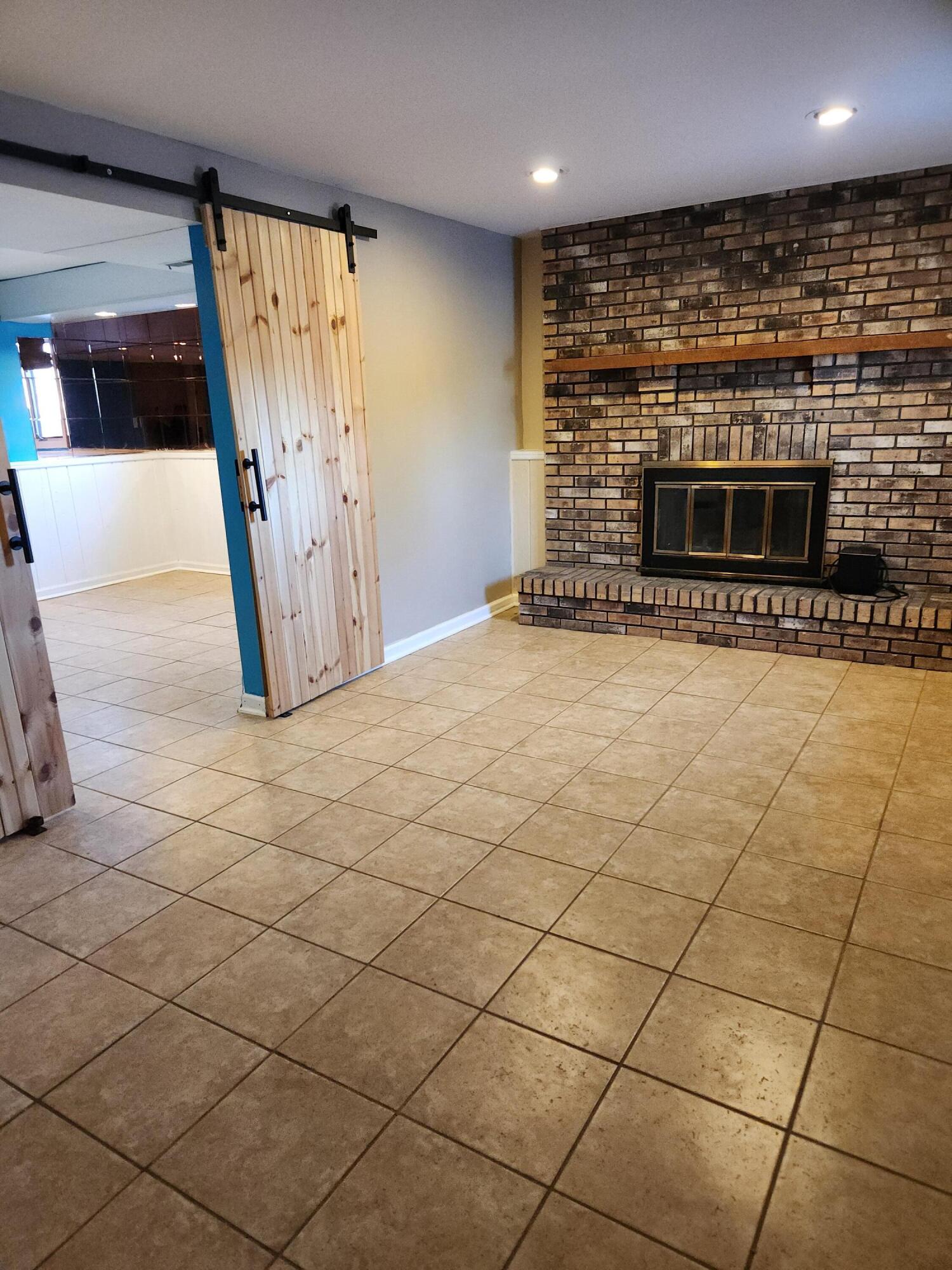 2308 Flint Court Dyer, IN 46311 - Photo 23 of 37 a view of a livingroom with fireplace and window