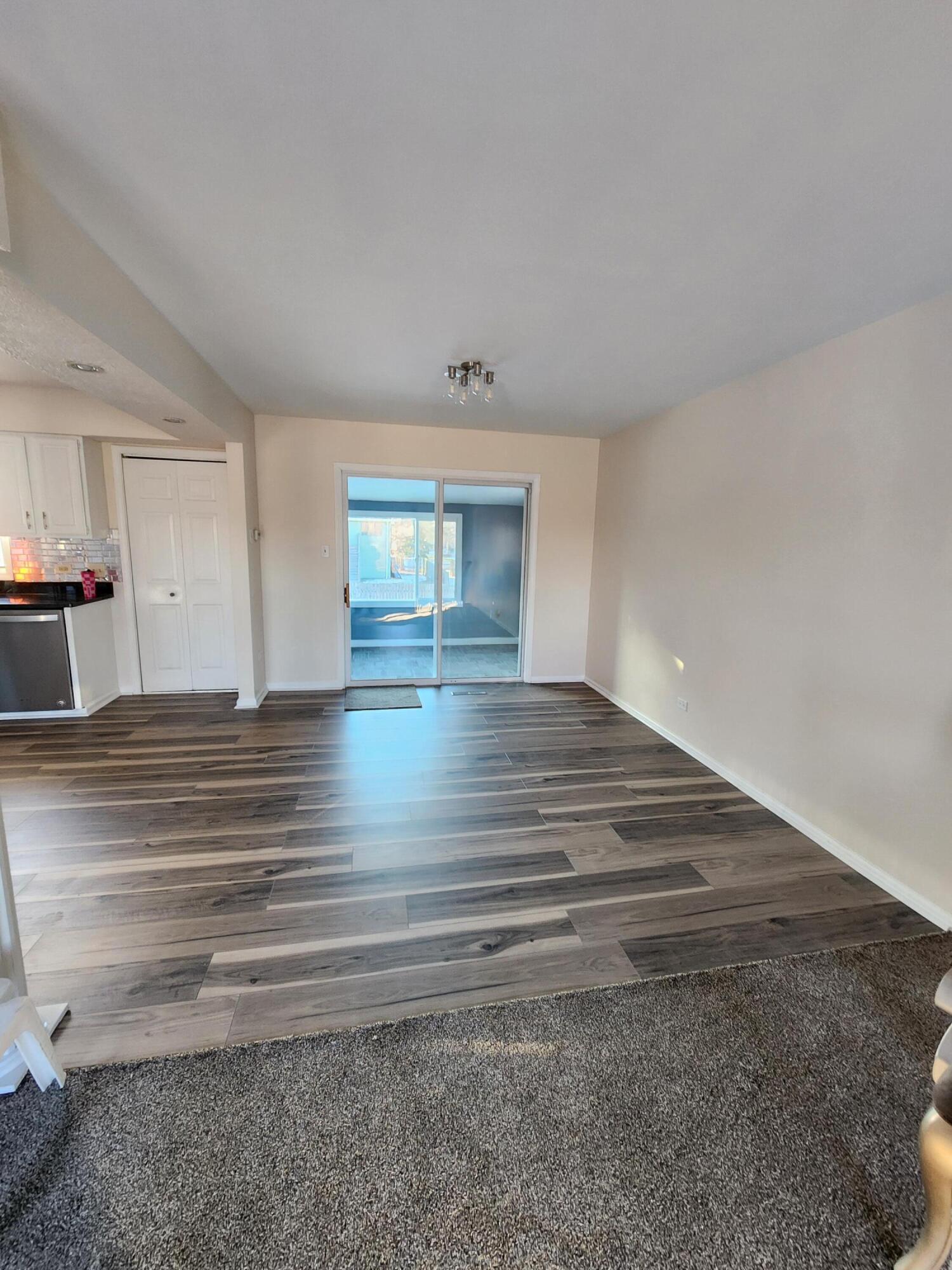 2308 Flint Court Dyer, IN 46311 - Photo 6 of 37 a view of an empty room and wooden floor