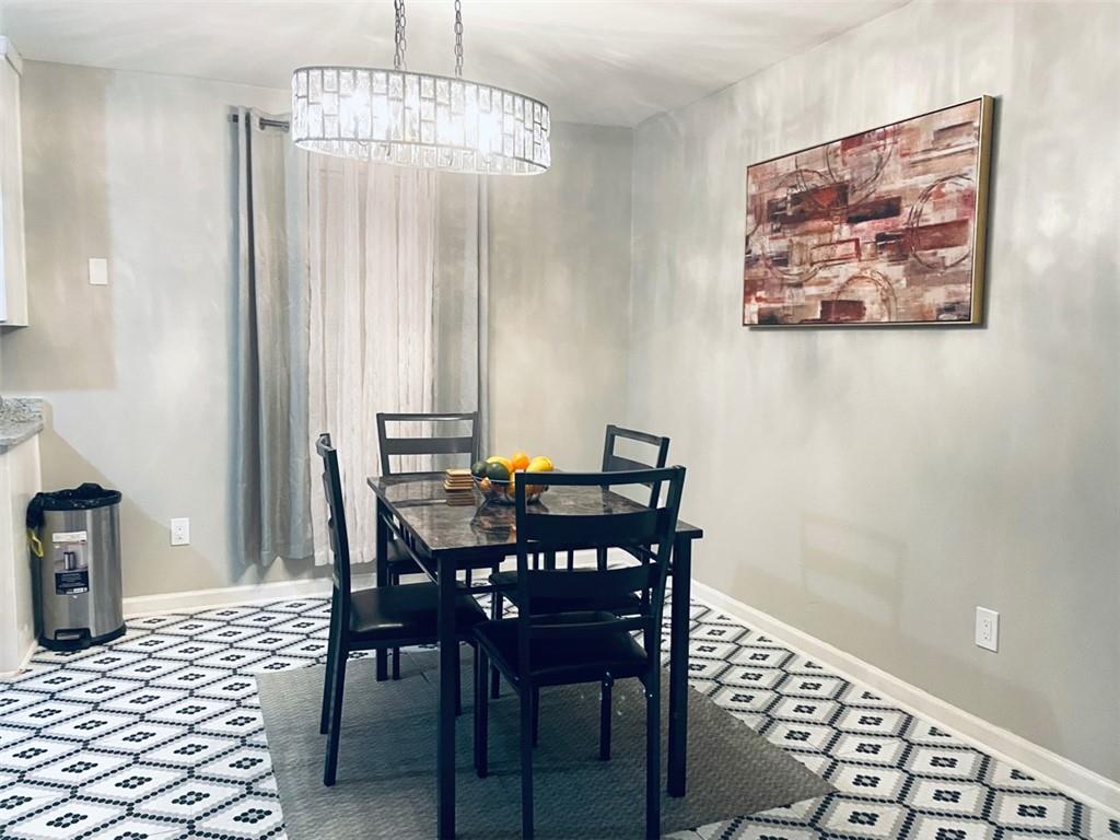 357 Waits Drive Southwest, Unit 1 Atlanta, GA 30331 - Photo 6 of 8 a view of a dining room with furniture