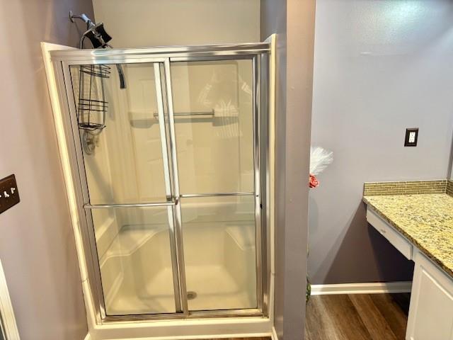 1300 Gates Circle Southeast Atlanta, GA 30316 - Photo 6 of 13 a bathroom with a glass shower door