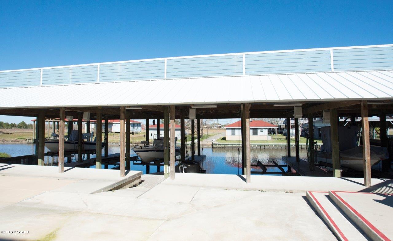 461 Lake Breeze Road, Unit E Hackberry, LA 70645 - Photo 18 of 20 Covered Boathouse
