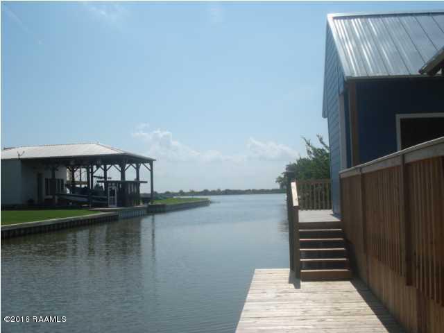 461 Lake Breeze Road, Unit E Hackberry, LA 70645 - Photo 2 of 20 Lake Breeze Townhomes deck