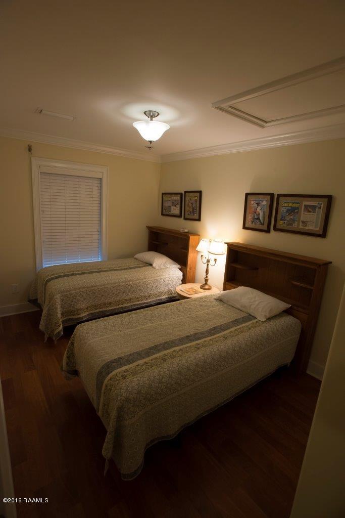 461 Lake Breeze Road, Unit E Hackberry, LA 70645 - Photo 9 of 20 Bedroom 3