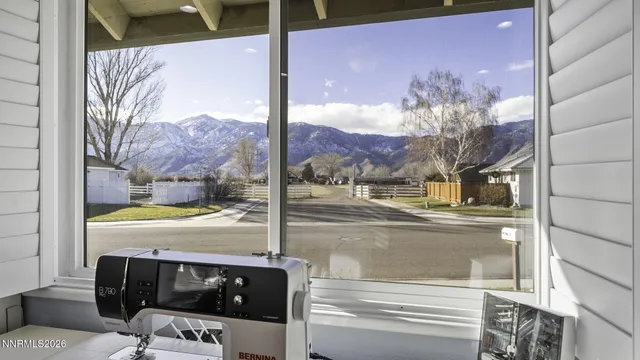 a view of a living room and bathroom