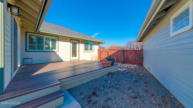 a view of backyard with deck