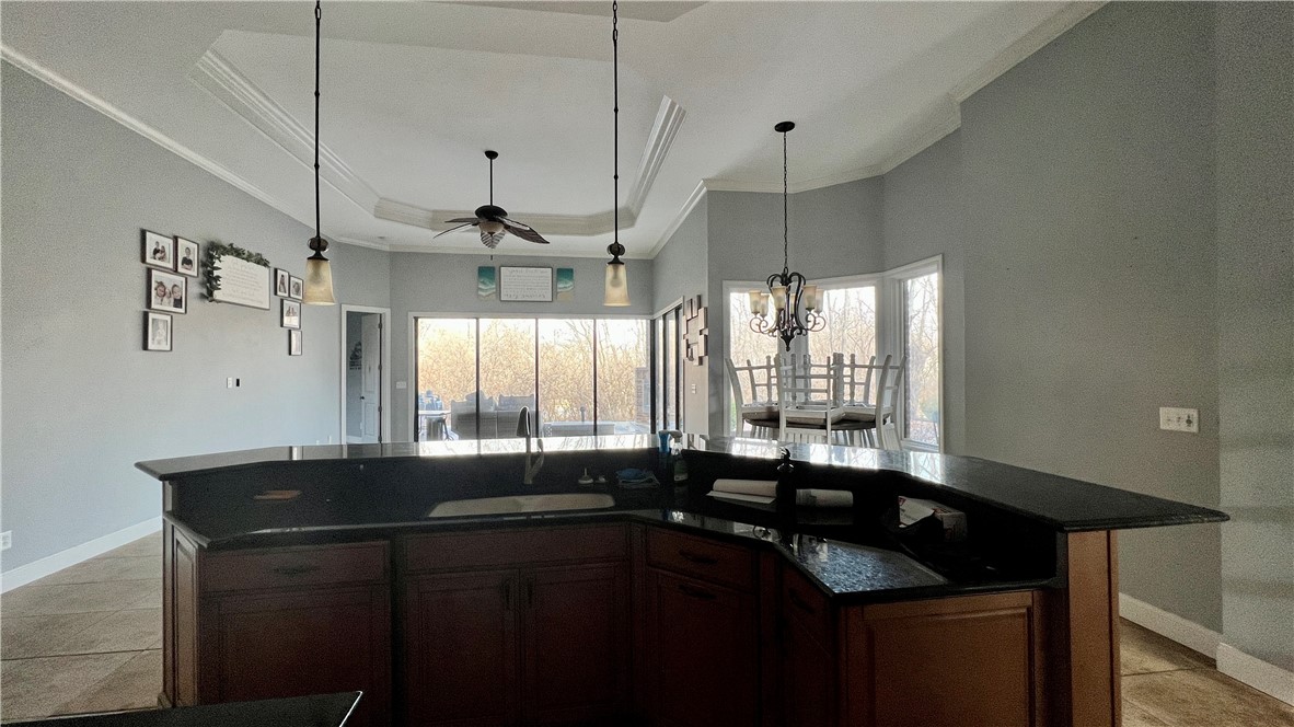 6362 Autumn Ridge Court Decatur, IL 62521 - Photo 13 of 40 a kitchen with a sink stove and cabinets