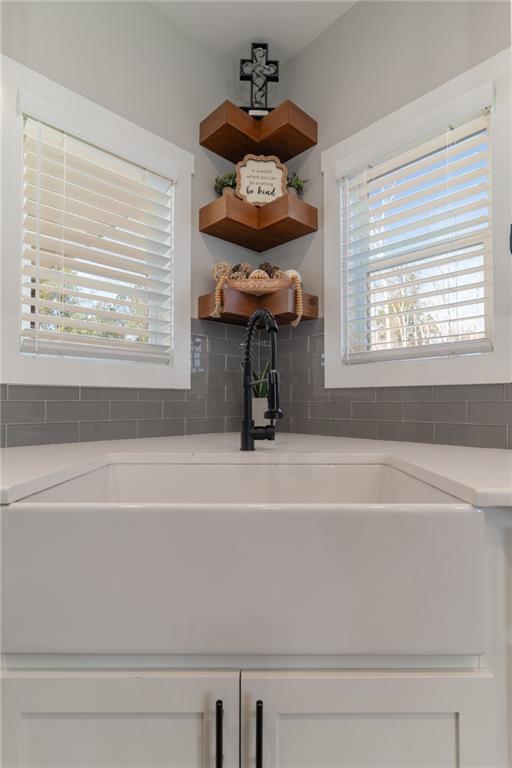 2250 Sperin Road Ball Ground, GA 30107 - Photo 20 of 56 a bathroom with a tub and a window