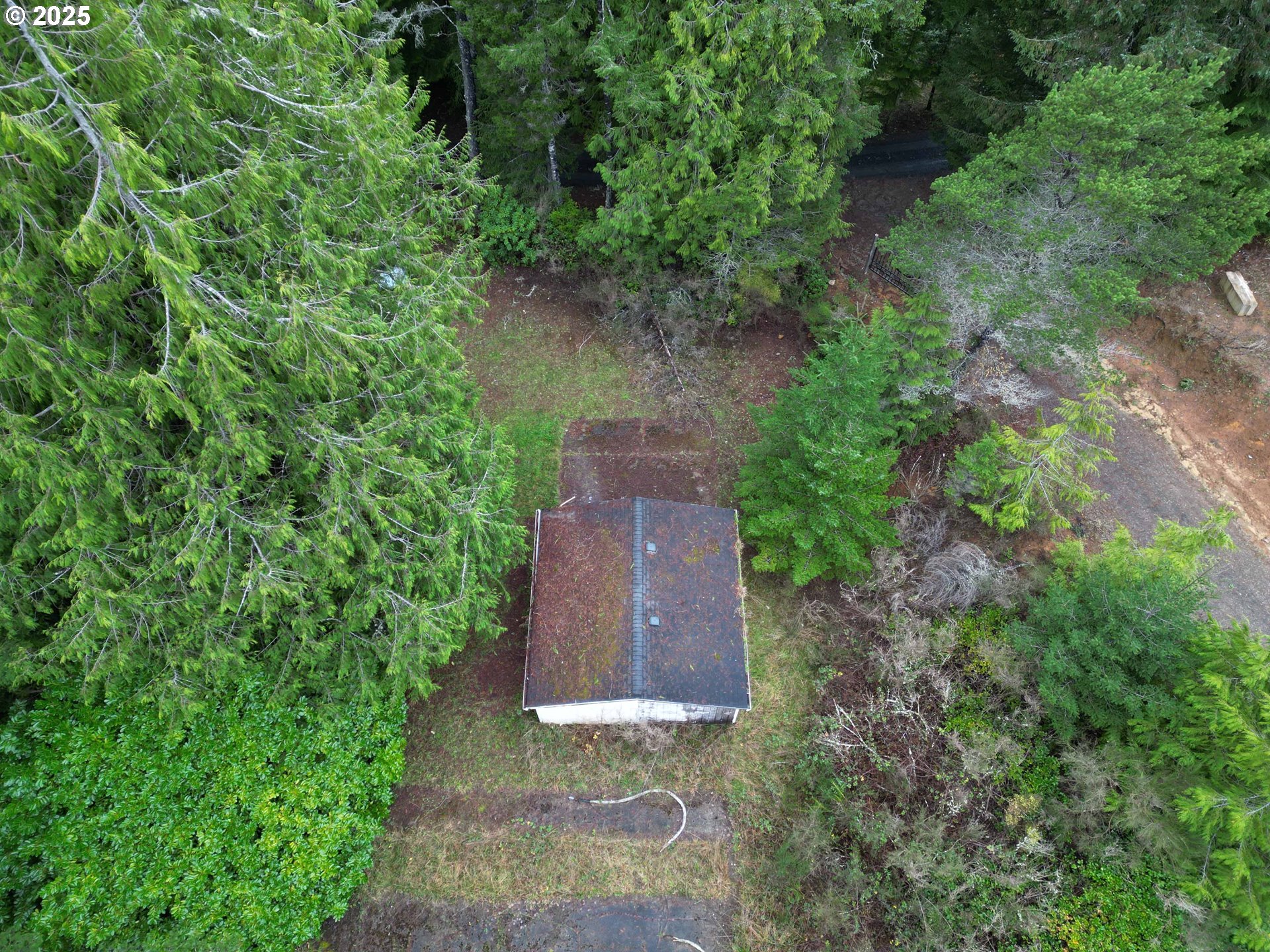 Hemlock Street, Unit TL 2200 Florence, OR 97439 - Photo 6 of 17 an aerial view of a house