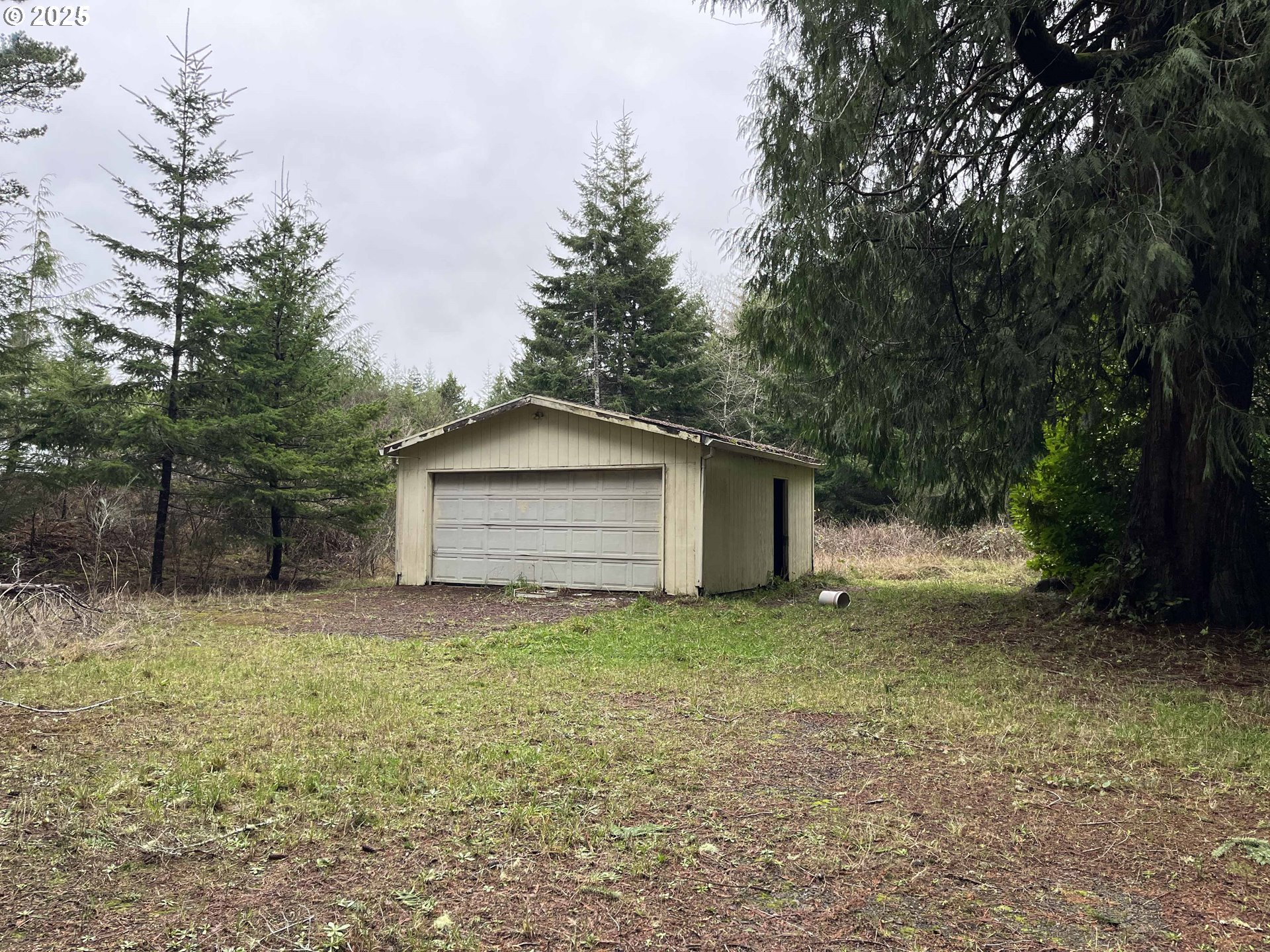 Hemlock Street, Unit TL 2200 Florence, OR 97439 - Photo 9 of 17 a view of a house with a yard