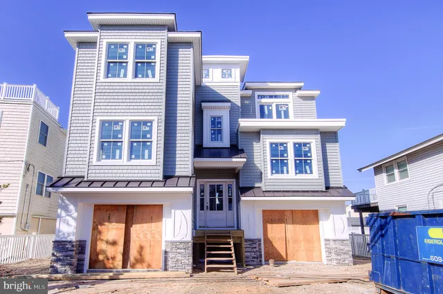 a front view of a building with balcony
