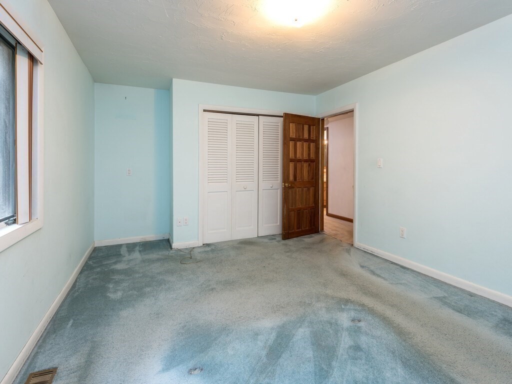 49 Denfield Road Charlton, MA 01507 - Photo 20 of 42 an empty room with windows