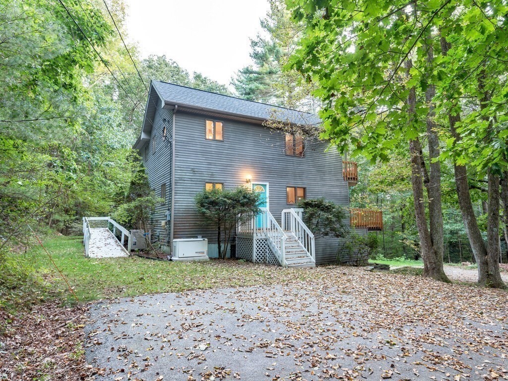 49 Denfield Road Charlton, MA 01507 - Photo 2 of 42 a view of a house with a yard