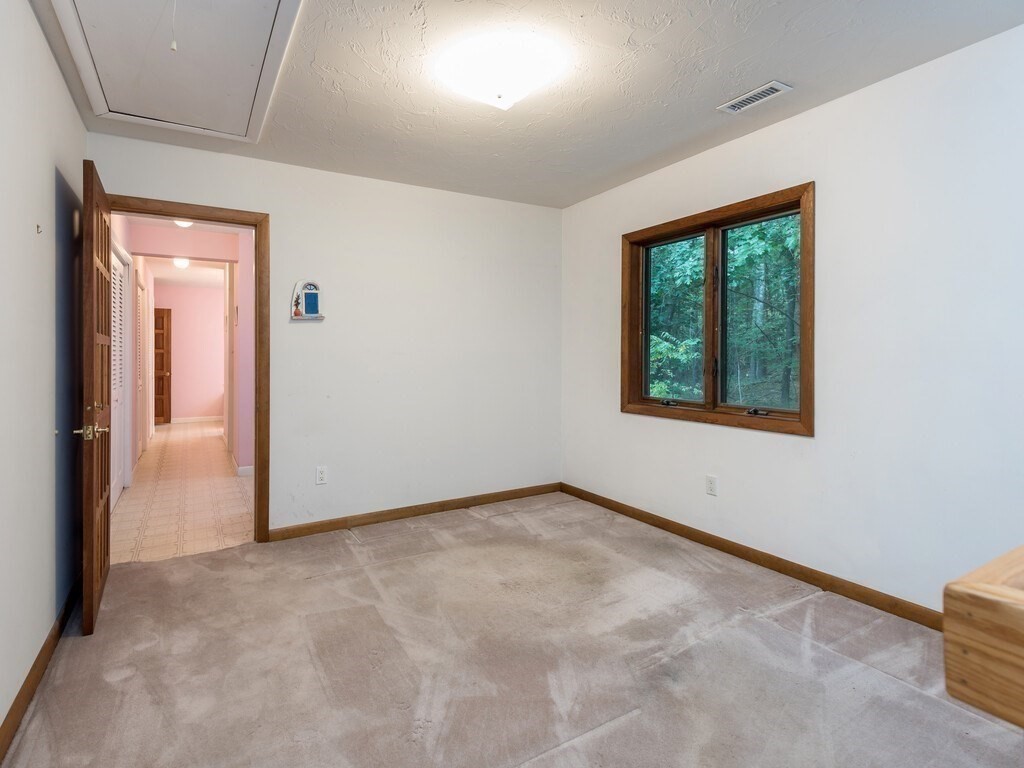49 Denfield Road Charlton, MA 01507 - Photo 21 of 42 an empty room with windows