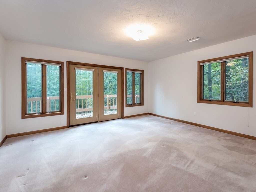 49 Denfield Road Charlton, MA 01507 - Photo 23 of 42 an empty room with windows