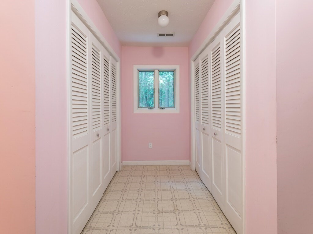 49 Denfield Road Charlton, MA 01507 - Photo 28 of 42 a view of a hallway with windows