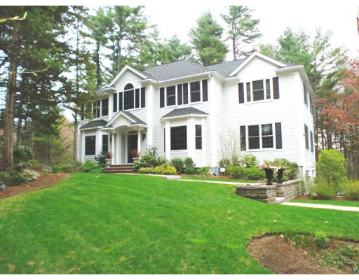 125 Conant Road Weston, MA 02493 - Photo 1 of 16 a front view of a house with a yard