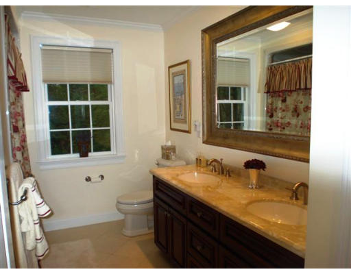 125 Conant Road Weston, MA 02493 - Photo 11 of 16 a bathroom with a granite countertop sink toilet and mirror