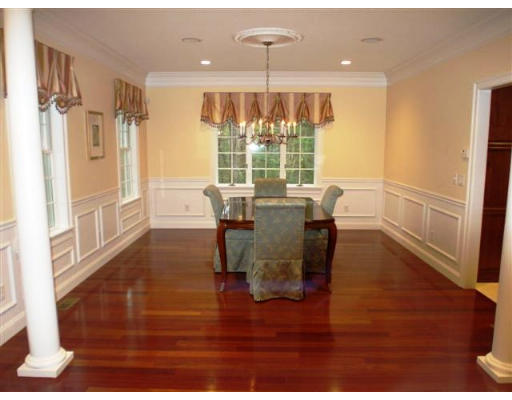 125 Conant Road Weston, MA 02493 - Photo 7 of 16 a view of a dining room with furniture window and wooden floor