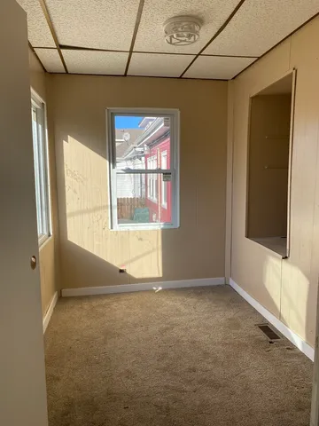 a room with furniture and window