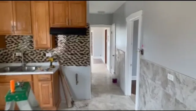 $430,000 | 7154 South Rockwell Street, Chicago, IL 60629