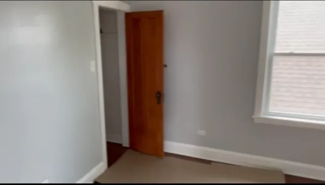 a view of walk in closet with window