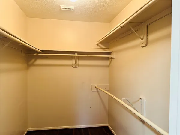 a view of a room with racks on the wall