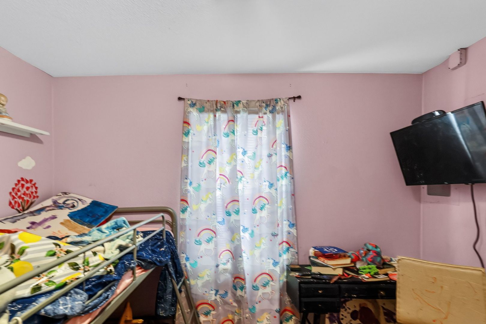 210 James Street Bethalto, IL 62010 - Photo 12 of 15 a bedroom with a bed and a tv in it