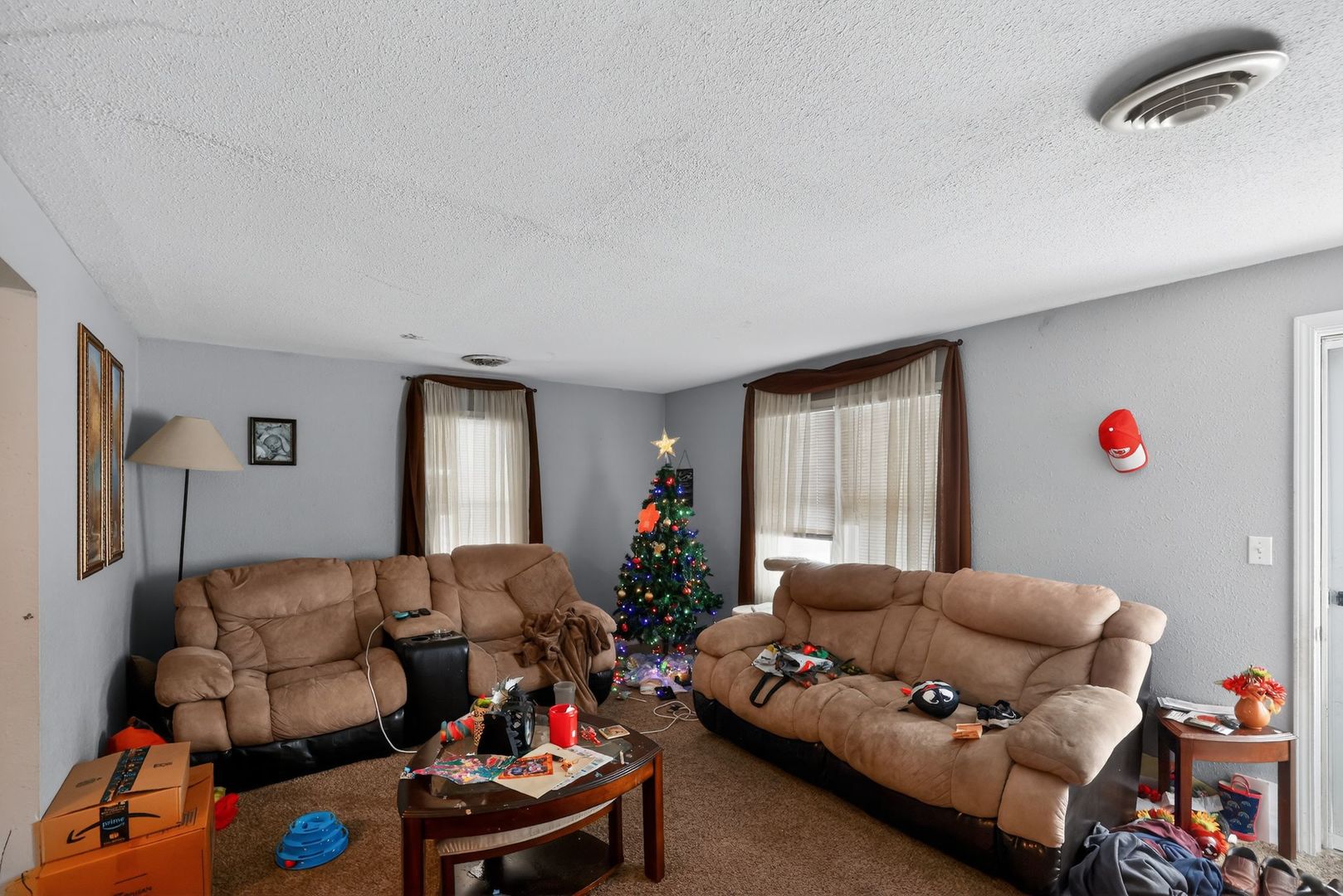 210 James Street Bethalto, IL 62010 - Photo 4 of 15 a living room with furniture and a couch