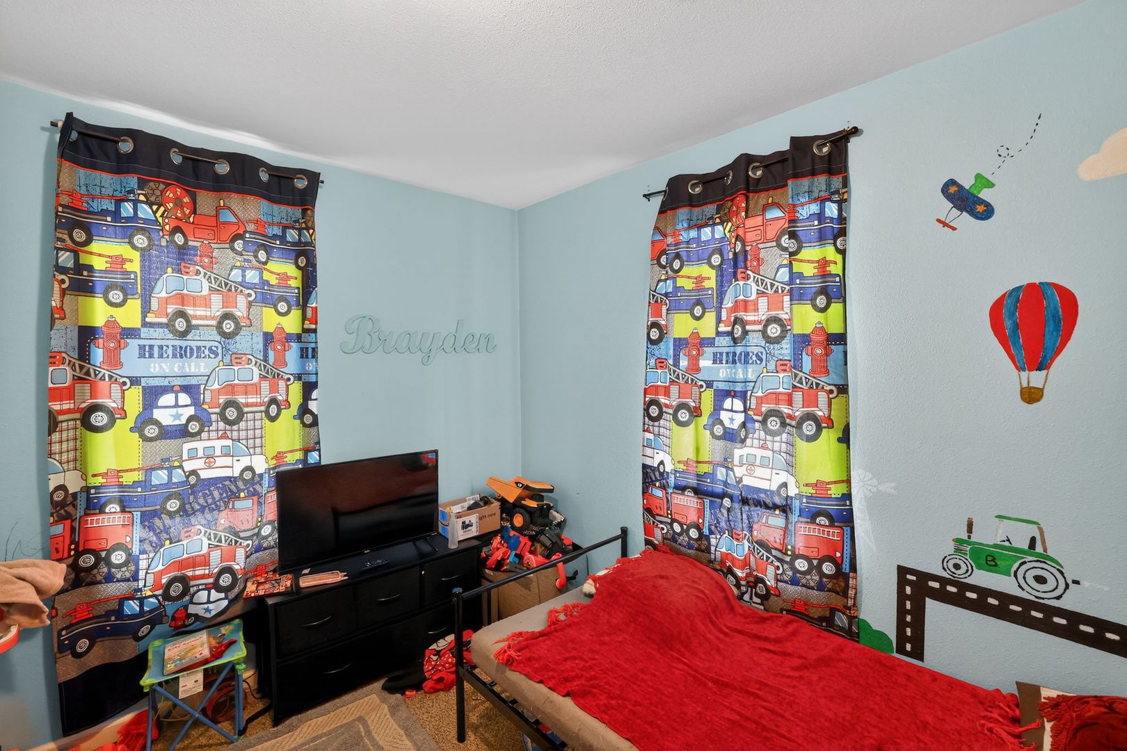 210 James Street Bethalto, IL 62010 - Photo 10 of 15 a living room with furniture and a flat screen tv