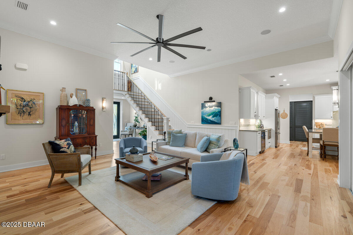 54 Ocean Way Drive Ponce Inlet, FL 32127 - Photo 11 of 76 a living room with furniture and a wooden floor