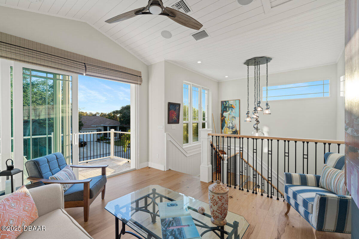 54 Ocean Way Drive Ponce Inlet, FL 32127 - Photo 34 of 76 a living room with furniture and a window
