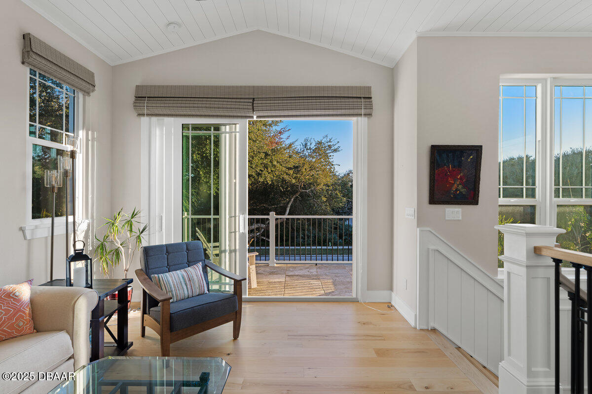 54 Ocean Way Drive Ponce Inlet, FL 32127 - Photo 35 of 76 a living room with furniture and a window