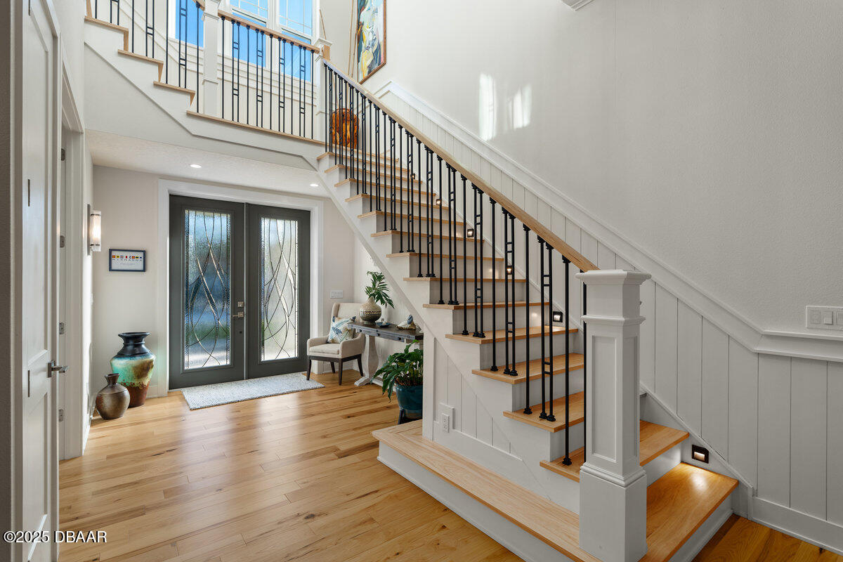 54 Ocean Way Drive Ponce Inlet, FL 32127 - Photo 4 of 76 a view of entryway and hall with wooden floor