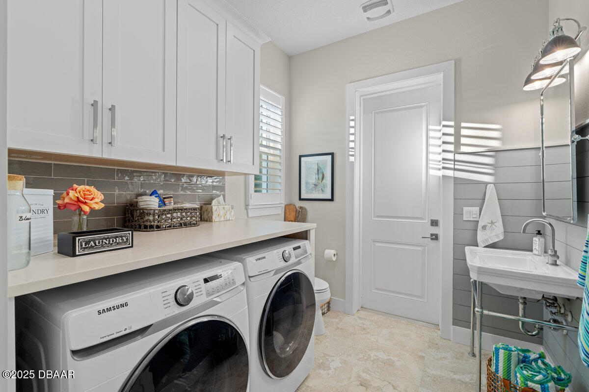 54 Ocean Way Drive Ponce Inlet, FL 32127 - Photo 41 of 76 a utility room with closet dryer and washer