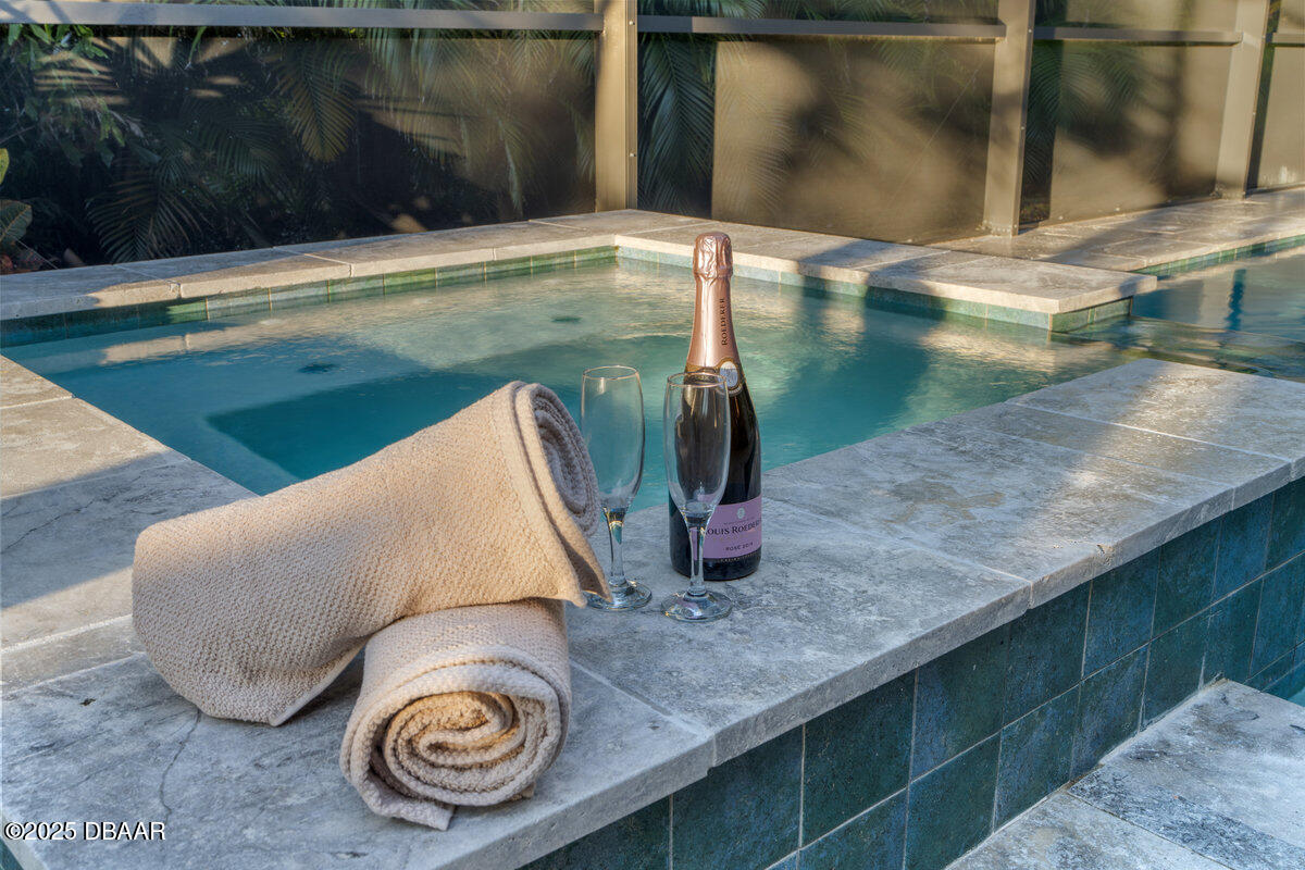 54 Ocean Way Drive Ponce Inlet, FL 32127 - Photo 45 of 76 a view of swimming pool with a sitting space