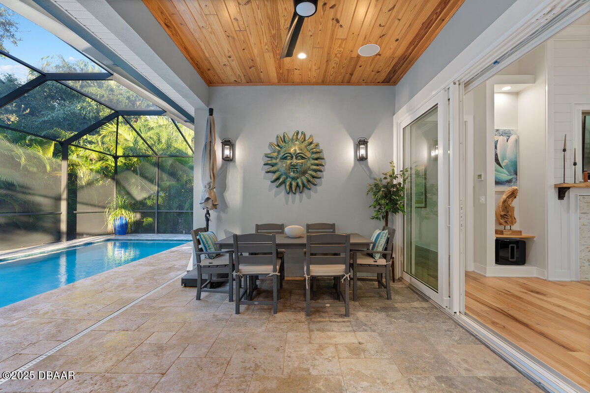 54 Ocean Way Drive Ponce Inlet, FL 32127 - Photo 51 of 76 a view of a dining room with furniture window and outside view