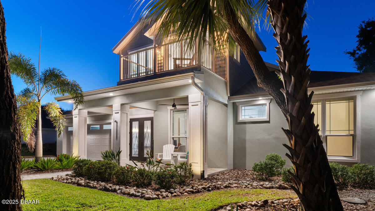 54 Ocean Way Drive Ponce Inlet, FL 32127 - Photo 57 of 76 a front view of a house with garden