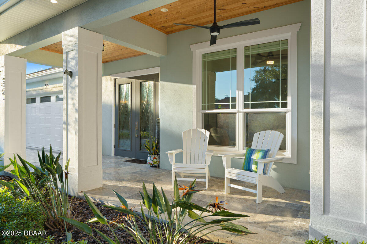 54 Ocean Way Drive Ponce Inlet, FL 32127 - Photo 61 of 76 a front view of a house with outdoor seating