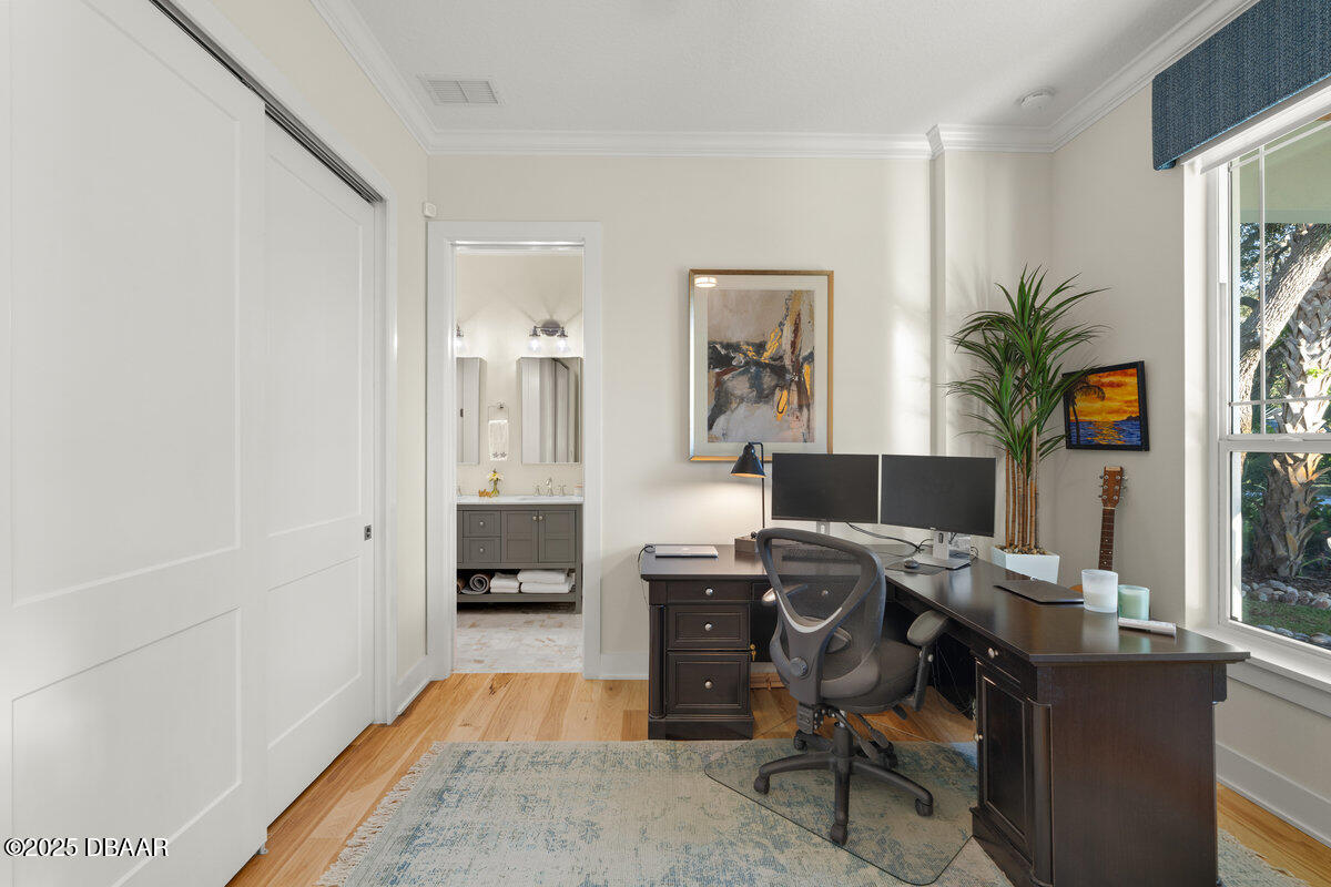 54 Ocean Way Drive Ponce Inlet, FL 32127 - Photo 8 of 76 a view of a workspace with furniture and a window