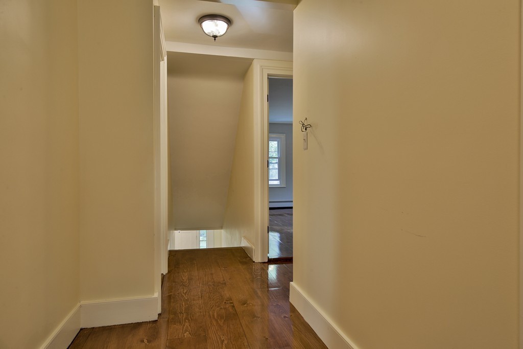 619 Main Street Boxford, MA 01921 - Photo 17 of 29 a view of a room with wooden floor