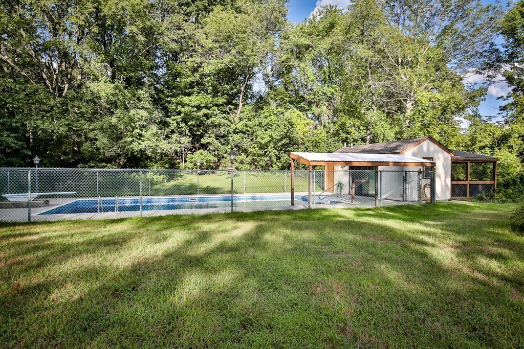 619 Main Street Boxford, MA 01921 - Photo 19 of 29 a view of a house with a big yard