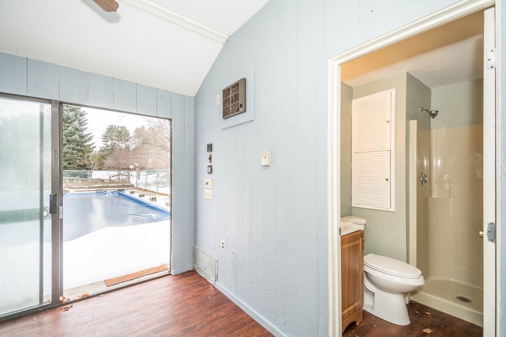 619 Main Street Boxford, MA 01921 - Photo 22 of 29 a bathroom with a toilet and a shower