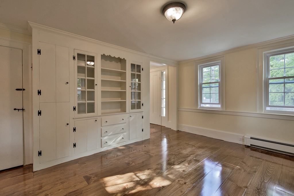 619 Main Street Boxford, MA 01921 - Photo 5 of 29 a view of an empty room with a window