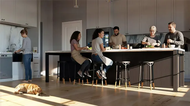 a living room with furniture a chandelier and a fireplace