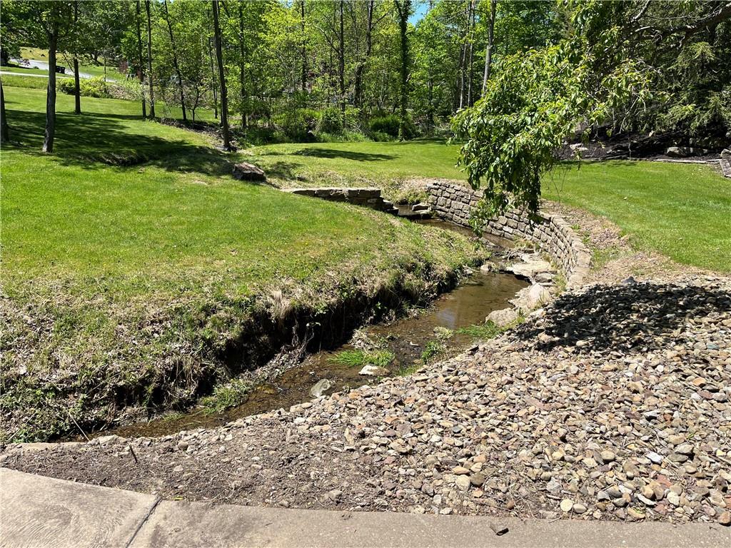 210 Edgewater Drive Monaca, PA 15061 - Photo 12 of 47 a view of a park with large trees