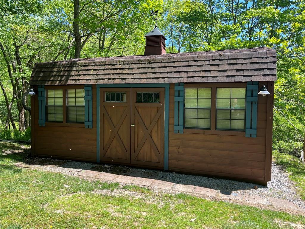 210 Edgewater Drive Monaca, PA 15061 - Photo 14 of 47 a backyard of a house with lots of green space