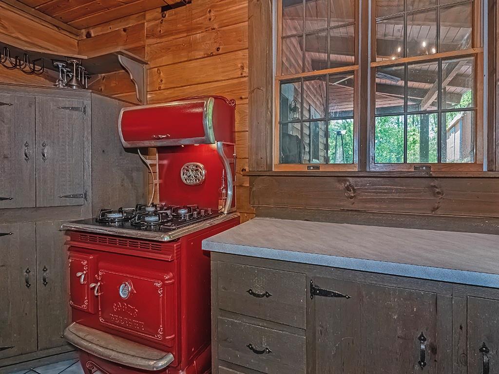 210 Edgewater Drive Monaca, PA 15061 - Photo 21 of 47 a kitchen with a stove and a cabinet